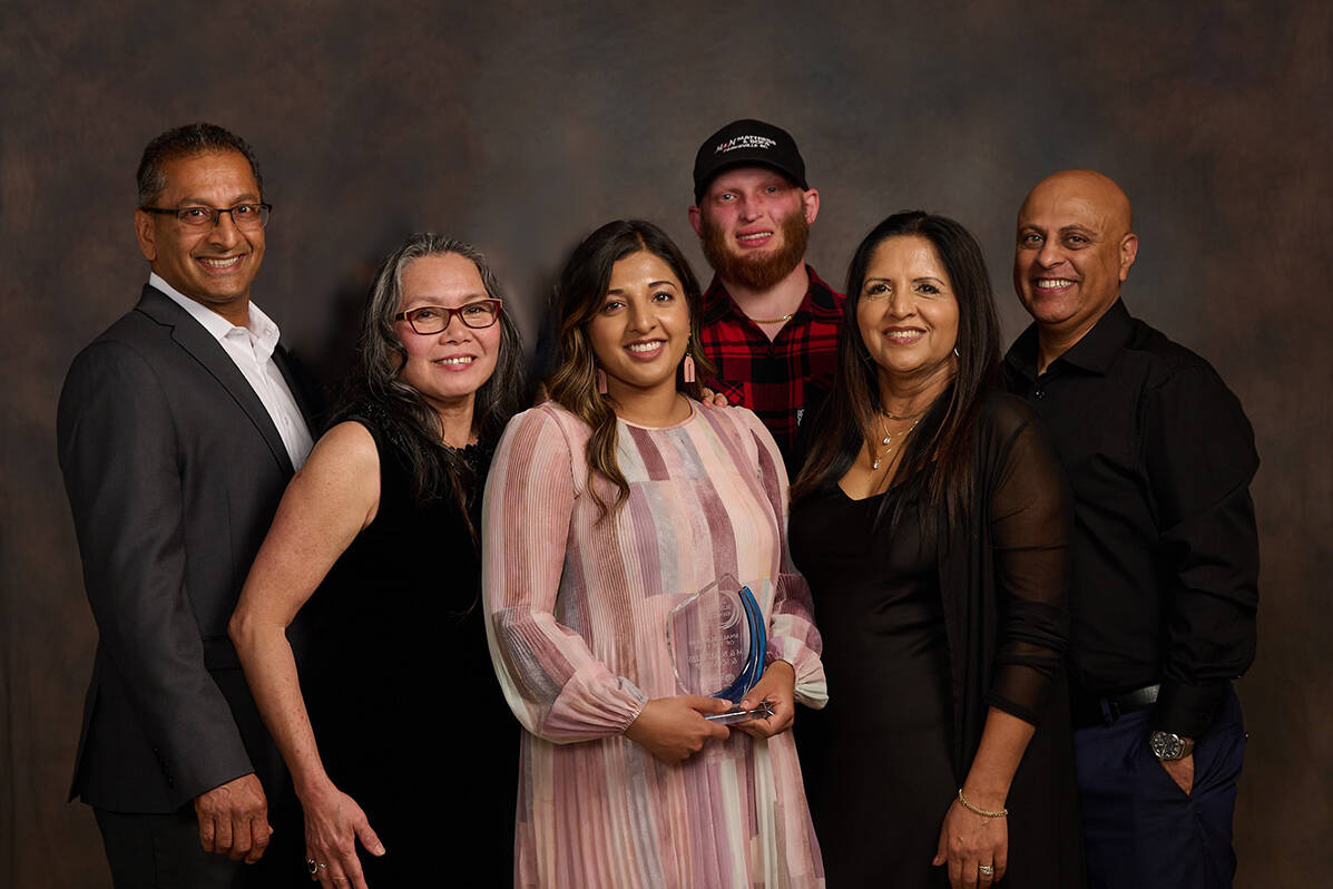 M&N Mattress and Sofa Gallery owner Mark Nagra (left) and many of the caring staff with their Small Business of the Year award from the 2022 Parksville and District Chamber of Commerce Awards.