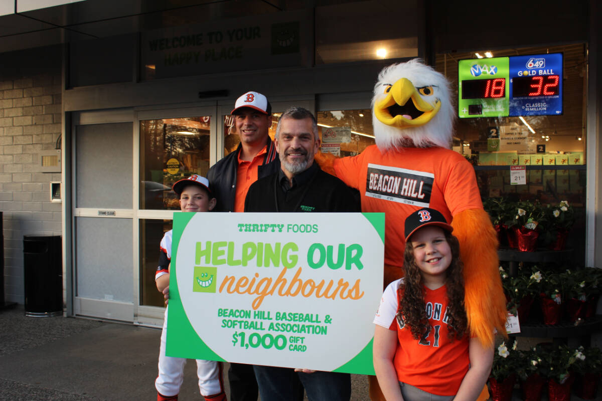 Fairfield Thrifty Foods store manager Ray Gudmundson continues the store’s long connection with Beacon Hill Little League, represented here by mascot Hollywood and members of the association. Samantha Duerksen/Black Press Media