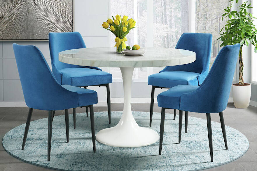 A variety of factors will guide your choice of dining table shape, including the shape and size of the room and its other design elements. Photo courtesy Dodd's Furniture & Mattress